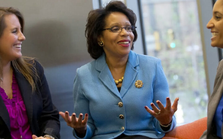 Photo of Dean JoAnne A. Epps speaking with students