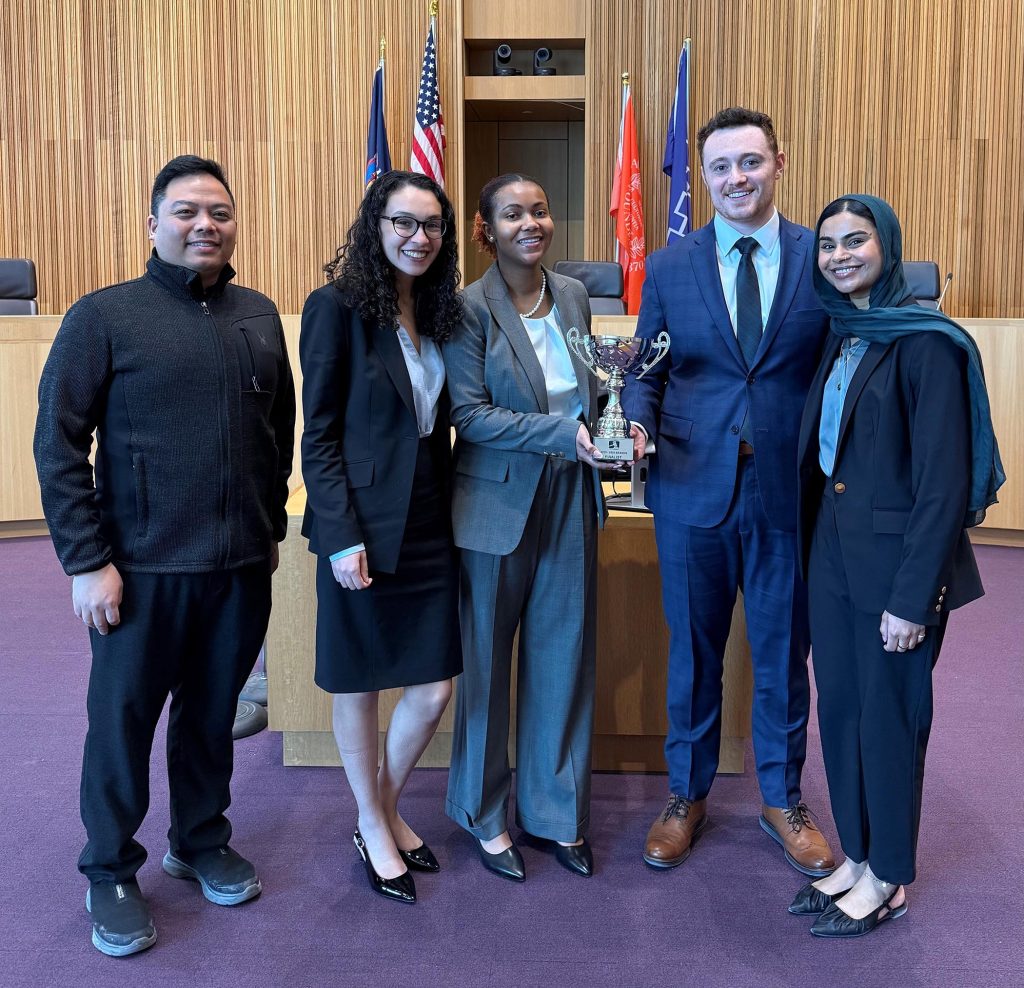 Photo caption, L to R: Coach Ayodale Tan, Elizabeth Beck, Indya Gettings, Emmett Reilly, Rabeea Ola.